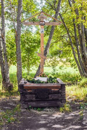 St. Petersburg, Russia-August 8, 2018: A wooden cross in memory of Grigory Rasputin in Alexander Park, Pushkin city.のeditorial素材