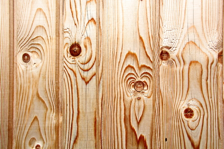 Wooden boards close-up with a view of the structure of the tree and knotsの写真素材