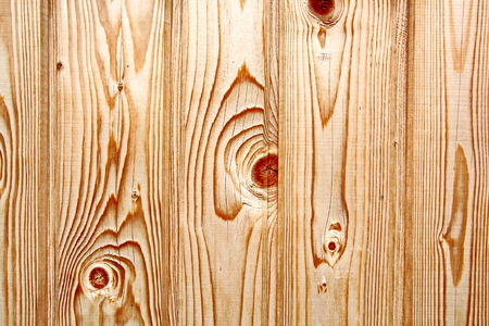 Wooden boards close-up with a view of the structure of the tree and knotsの写真素材