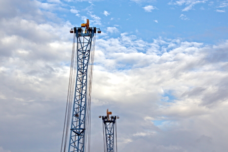 Ship structures, masts, antennas, funnel, ship wheelhouse against the blue sky and clouds.の写真素材