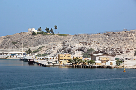 Type of port berths with moored vessels. Port of Salalah, Oman.の写真素材