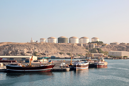 Type of port berths with moored vessels. Port of Salalah, Oman.の写真素材