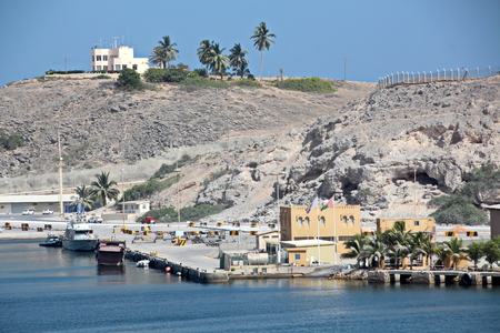Type of port berths with moored vessels. Port of Salalah, Oman.の写真素材