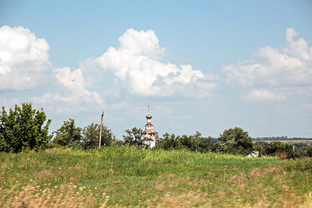Landscape views of nature, fields, villages, Ukraine. View from the car window when driving.の写真素材