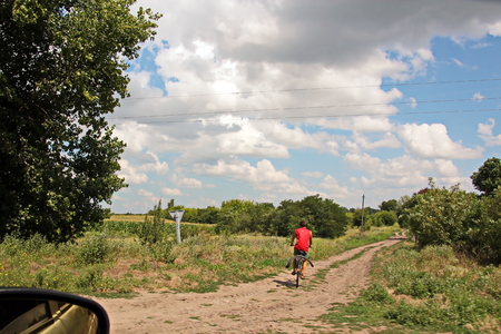 Landscape views of nature, fields, villages, Ukraine. View from the car window when driving.の写真素材