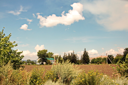 Landscape views of nature, fields, villages, Ukraine. View from the car window when driving.の写真素材