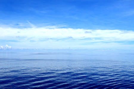 Seascape, blue sky, clouds and sea in the tropical waters of the Pacific Ocean.