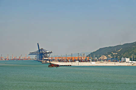 Type of cargo terminal and cranes, berths for transshipment of bulk cargo, iron ore and coal. Port...