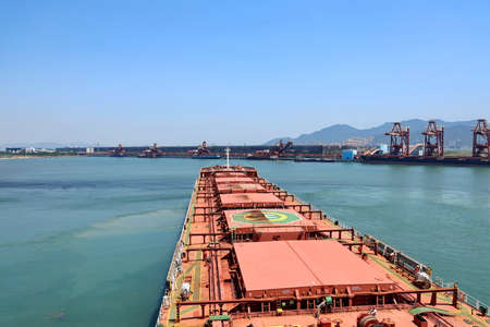Cargo terminal for transshipment of bulk cargo, iron ore and coal. Bulk carrier movement using...