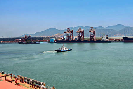 Cargo terminal for transshipment of bulk cargo, iron ore and coal. Bulk carrier movement using...
