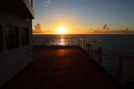 View of the sunset from the ship underway and in the port. Colorful views of the surface of the...