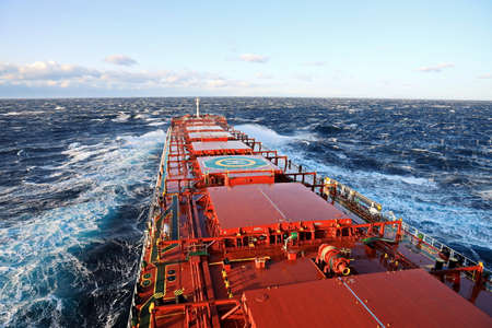 The movement of the vessel against the waves during a heavy storm. North Pacific ocean.の写真素材