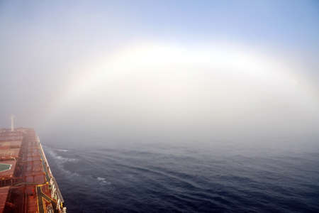 Fog at sea limits the visibility of ships during navigation. Pacific ocean