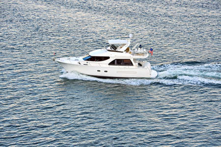 Seagoing vessels, tugboats, pleasure boats and yachts on the roads of the port of Tacoma, USA....