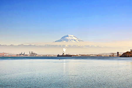 Mount Rainier over Tacoma, Washington, USA. Views of the volcano from the side of Commensement Bay. October, 2019.の写真素材