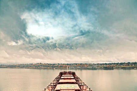 Various panoramic views of the coastline and Commencement Bay against the rain, fog and clouds....