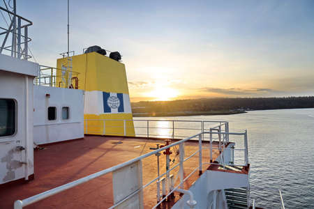 Tacoma, WA, USA, October, 23-25, 2019. MV Egyptian Mike. Repainting the ship's funnel and drawing...