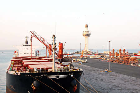 Cargo terminal for transshipment of grain, containers and other cargoes. Jeddah Port, Saudi Arabia. December, 2018.の写真素材