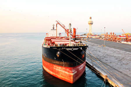 Various types of vessels calling at the port and moored at the berth. Tugs in the port. Jeddah Port,...