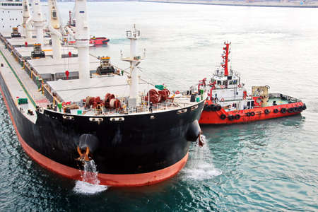 Various types of vessels calling at the port and moored at the berth. Tugs in the port. Jeddah Port,...
