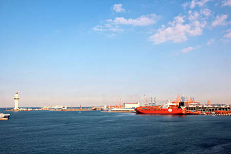 Panoramic view of the port, piers with ships moored and in motion. Red Sea. Jeddah Port, Saudi...
