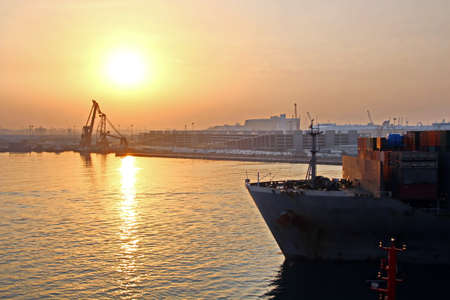 Night views of ships and berths in the port. Colorful views, the play of colors at sunset. Port...
