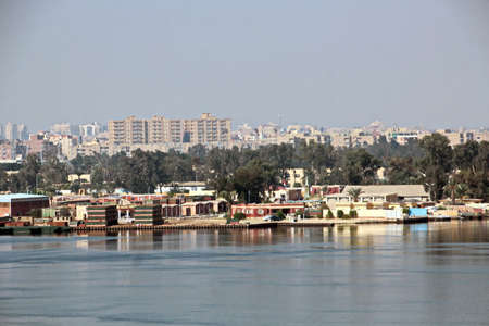 Passage through the Suez Canal by large sea vessels.Panoramic view of the coast and canal in the...