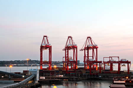 Liverpool port. Port of Liverpool, England, May, 12,2019. Cargo terminal for unloading bulk cargo and containers by coastal cranes.のeditorial素材