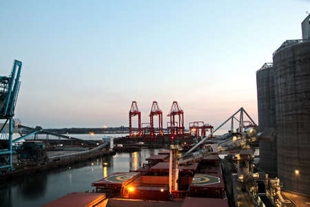 Liverpool port. Port of Liverpool, England, May, 12,2019. Cargo terminal for unloading bulk cargo and containers by coastal cranes.のeditorial素材