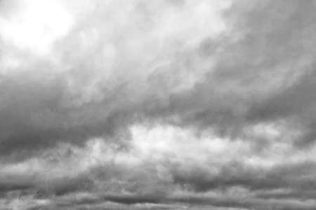 Before the storm. A painted view of storm and rain clouds and the sky above the sea horizon. View...