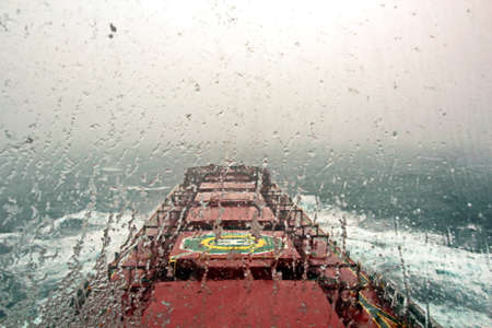 Before the storm. A painted view of storm and rain clouds and the sky above the sea horizon. View...