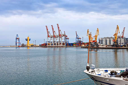 Port of Odessa, Ukraine, March, 06, 2020. Views of container and cargo berths with sea vessels, tugs and yachts in the port.のeditorial素材