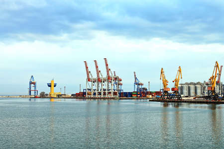 Port of Odessa, Ukraine, March, 06, 2020. Views of container and cargo berths with sea vessels, tugs and yachts in the port.のeditorial素材