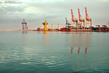 Port of Odessa, Ukraine, March, 06, 2020. Views of container and cargo berths with sea vessels, tugs and yachts in the port.のeditorial素材