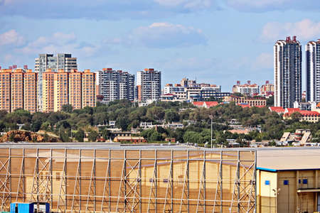 Jinzhou, China, September 18,2020. Cargo terminal for unloading bulk cargoes by shore cranes and grabs. Views of cargo equipment for discharging of bulk cargoes.のeditorial素材