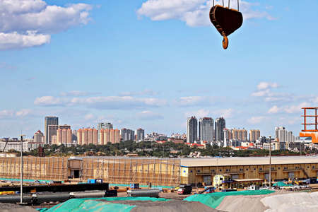 Jinzhou, China, September 18,2020. Cargo terminal for unloading bulk cargoes by shore cranes and grabs. Views of cargo equipment for discharging of bulk cargoes.のeditorial素材