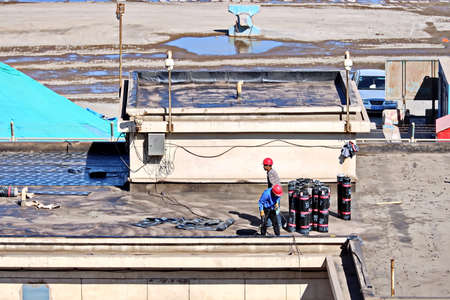 Jinzhou, China, September 18,2020. Cargo terminal for unloading bulk cargoes by shore cranes and grabs. Views of cargo equipment for discharging of bulk cargoes.のeditorial素材