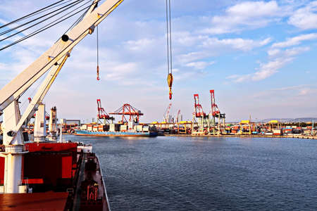 Port of Taichung, Taiwan, September, 24,2020. Cargo terminal for unloading bulk cargoes by shore...