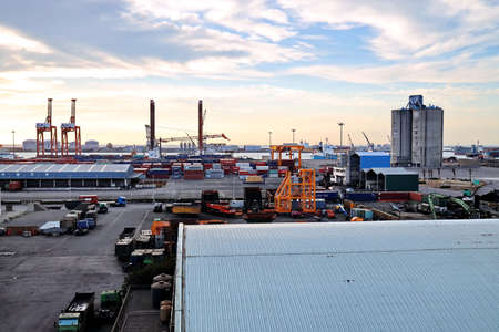 Port of Taichung, Taiwan, September, 24,2020. Cargo terminal for unloading bulk cargoes by shore cranes. Views of the pier and vessels under discharging operations.のeditorial素材