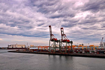 Port of Taichung, Taiwan. September, 24, 2020. Container terminal and vessels at the port while cargo operations and underway.のeditorial素材