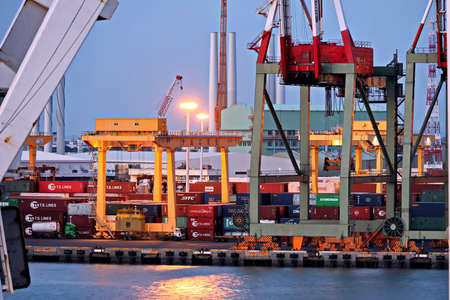 Port of Taichung, Taiwan. September, 24, 2020. Container terminal and vessels at the port while cargo operations and underway.のeditorial素材