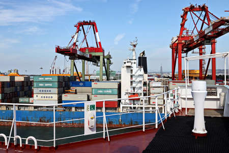 Port of Taichung, Taiwan. September, 24, 2020. Container terminal and vessels at the port while...