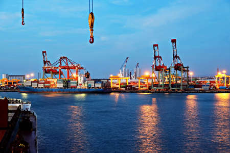 Port of Taichung, Taiwan. September, 24, 2020. Container terminal and vessels at the port while cargo operations and underway.のeditorial素材