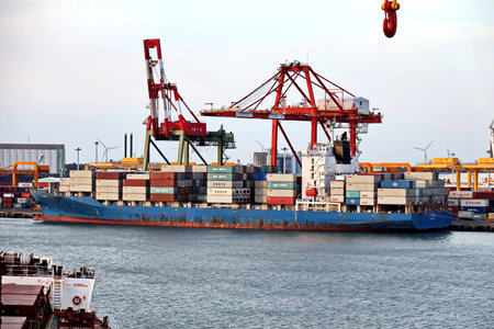 Port of Taichung, Taiwan. September, 24, 2020. Container terminal and vessels at the port while cargo operations and underway.のeditorial素材