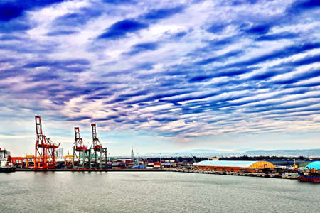 Port of Taichung, Taiwan. September, 24, 2020. Container terminal and vessels at the port while cargo operations and underway.のeditorial素材