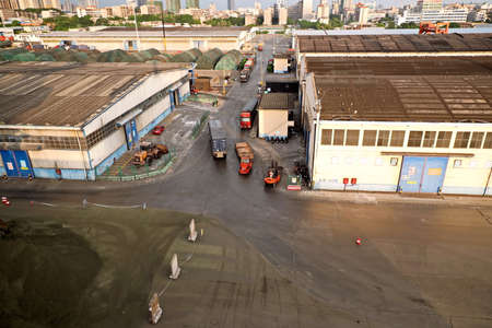 Fangcheng, China, September 30,2020. Cargo terminal for unloading bulk cargoes by shore cranes and...