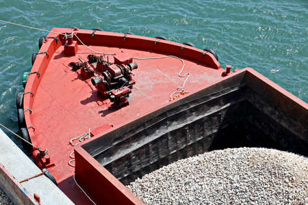 Close-up views of equipments, constructions of vessel, barges, tugboats and small boats at the...