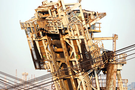 Haldia, India, October, 27, 2020. Cargo terminal for unloading bulk cargo of limestone by shore cranes and grabs. Views of cargo equipment for discharging of bulk cargoes.のeditorial素材
