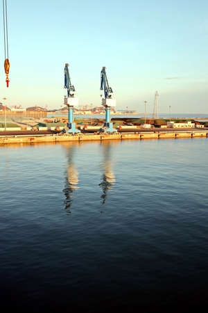 View of onshore harbor cranes and their structures in the port of Huludao, China.