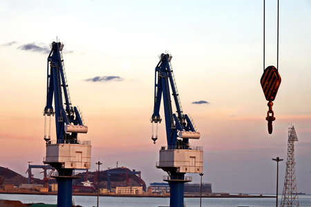 View of onshore harbor cranes and their structures in the port of Huludao, China.